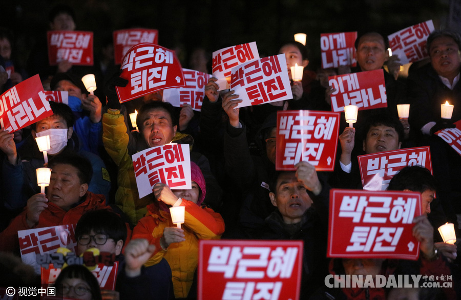 韩首尔市长领导民众烛光集会呼吁朴槿惠下台